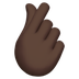 Bagaimana Hand with Index Finger and Thumb Crossed: Dark Skin Tone emoji terlihat di Apple.