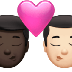 Bagaimana Kiss: Man, Man, Dark Skin Tone, Light Skin Tone emoji terlihat di Apple.