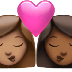 Bagaimana emoji Cium: perempuan, perempuan, ton kulit sederhana dan ton kulit sederhana gelap kelihatan di Apple.