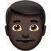 Bagaimana Man: Dark Skin Tone emoji terlihat di Apple.