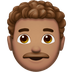 Bagaimana emoji Lelaki: ton kulit sederhana dan rambut kerinting kelihatan di Apple.