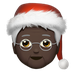 Bagaimana Mx Claus: Dark Skin Tone emoji terlihat di Apple.