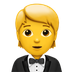 Bagaimana Person in Tuxedo emoji terlihat di Apple.