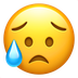 Bagaimana Sad but Relieved Face emoji terlihat di Apple.