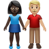 Bagaimana Woman and Man Holding Hands: Dark Skin Tone, Medium-Light Skin Tone emoji terlihat di Apple.