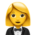 Bagaimana Woman in Tuxedo emoji terlihat di Apple.