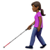 Bagaimana Woman with White Cane: Medium-Dark Skin Tone emoji terlihat di Apple.