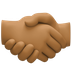 Bagaimana Handshake: Medium-Dark Skin Tone emoji terlihat di Facebook.