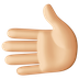 Bagaimana Leftwards Hand: Medium-Light Skin Tone emoji terlihat di Facebook.