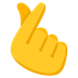 Cómo se ve el emoji Mano con dedo índice y pulgar cruzados en Google.