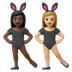 Hvordan Kvinder med kaninører: mørk teint og medium til lys teint emoji ser ud på Google.