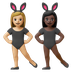 Hvordan Kvinder med kaninører: medium til lys teint og mørk teint emoji ser ud på Google.