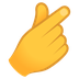 How Hand with Index Finger and Thumb Crossed emoji looks on Joypixels.