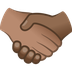 Bagaimana Handshake: Medium Skin Tone, Medium-Dark Skin Tone emoji terlihat di Joypixels.