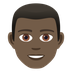 Bagaimana Man: Dark Skin Tone emoji terlihat di Joypixels.