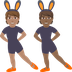 Hur Personer med kaninöron: mellanfärgad hy, mellanmörk hy emoji ser ut på Joypixels.