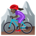 How Woman Mountain Biking: Dark Skin Tone emoji looks on Joypixels.