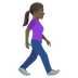 How Woman Walking Facing Right: Dark Skin Tone emoji looks on Joypixels.