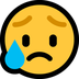 Bagaimana Sad but Relieved Face emoji terlihat di Microsoft.