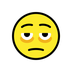 A quoi ressemblent les emoji Visage avec des valises sous les yeux sur Openmoji.