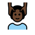 Как выглядит эмодзи Человеку массируют лицо: очень темный тон кожи в Openmoji.