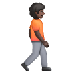 Bagaimana Person Walking Facing Right: Dark Skin Tone emoji terlihat di Samsung.