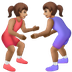איך נשים מתאבקות: גוון עור בינוני emoji נראה על Samsung.