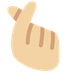 How Hand with Index Finger and Thumb Crossed: Medium-Light Skin Tone emoji looks on Twitter.