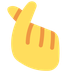 Wie Hand mit gekreuztem Zeigefinger und Daumen Emoji auf Twitter aussieht.