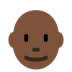 How Man: Dark Skin Tone, Bald emoji looks on Twitter.