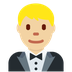 How Man in Tuxedo: Medium-Light Skin Tone emoji looks on Twitter.