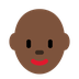 How Woman: Dark Skin Tone, Bald emoji looks on Twitter.