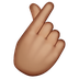 How Hand with Index Finger and Thumb Crossed: Medium Skin Tone emoji looks on Whatsapp.