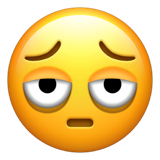 Hvordan Fjes med poser under øynene emoji ser ut på Apple.