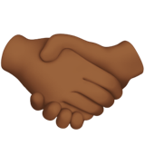 How Handshake: Medium-Dark Skin Tone emoji looks on Apple.