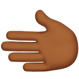 How Leftwards Hand: Medium-Dark Skin Tone emoji looks on Apple.