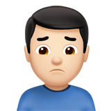 How Man Frowning: Light Skin Tone emoji looks on Apple.