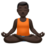 How Man in Lotus Position: Dark Skin Tone emoji looks on Apple.