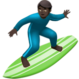 How Man Surfing: Dark Skin Tone emoji looks on Apple.