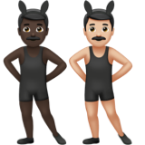 A quoi ressemblent les emoji Hommes avec des oreilles de lapin : peau foncée et peau claire sur Apple.