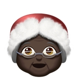 How Mrs. Claus: Dark Skin Tone emoji looks on Apple.