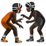 A quoi ressemblent les emoji Personnes faisant de la lutte : peau foncée sur Apple.