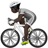 How Person Biking: Dark Skin Tone emoji looks on Apple.