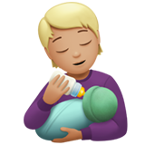 A quoi ressemblent les emoji Personne allaitant un bébé: peau moyennement claire sur Apple.