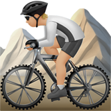 How Person Mountain Biking: Medium-Light Skin Tone emoji looks on Apple.