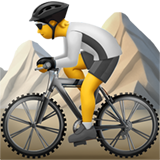 How Person Mountain Biking emoji looks on Apple.