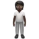 How Person Standing: Dark Skin Tone emoji looks on Apple.