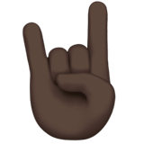 How Sign of the Horns: Dark Skin Tone emoji looks on Apple.