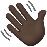 How Waving Hand: Dark Skin Tone emoji looks on Apple.