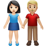 Cómo se ve el emoji Mujer y hombre de la mano: tono de piel claro y tono de piel claro medio en Apple.